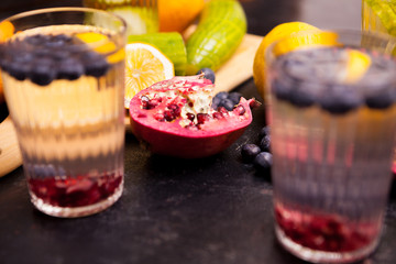 Organic natural detox water on dark wooden background