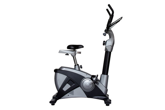 Upright bike for exercise in gym or fitness isolated on white background with clipping path.
