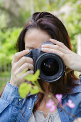 woman take a photo in nature