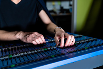 Young sound crew in acoustic chamber.