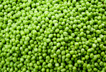 Fototapeta na wymiar Peas. Green background. Green peas background. Top view.