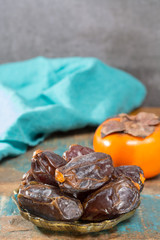 Traditional Middle East dessert, healthy food, big medjool dates fruits.