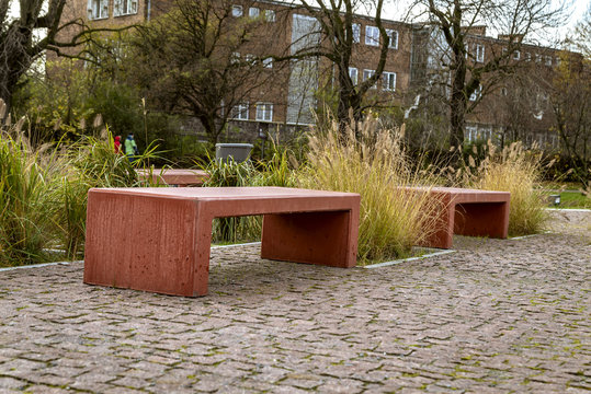 Concrete benches in red color