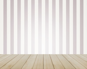 Empty top of vintage striped pattern wall and wooden deck tabletop.For product display