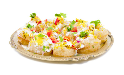 Indian Sweet And Spicy Chaat item Dahi Puri Also Called Dahi Batata Puri, Golgappe, Dahi Bhalle, Gol Gappa or Dahipuri Stuffed With Potato, Yogurt, Sev, Coriander, Chutney isolated on White Background © HeyRix