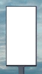 Blank vertical billboard against a blue sky.