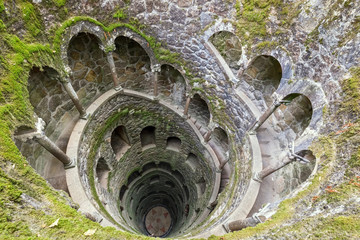 The Initiation Well (Inverted tower) in Quinta da Regaleira estate. Sintra. Portugal
