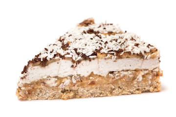 Vegan banoffee pie made from oats, dates, bananas and coconut cream isolated on white background