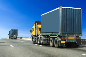 Truck on highway road with blue container, transportation concept.,import,export logistic industrial Transporting Land transport on asphalt expressway with blue sky