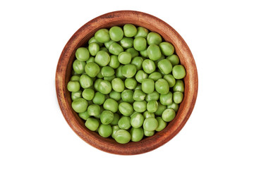 Fresh raw green peas in wooden bowl isolated on white background. Top view