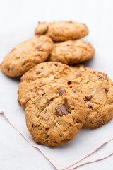 Chocolate oatmeal cookies on the  wooden background.
