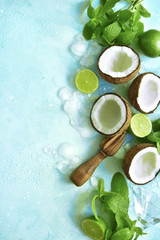 Food background with ingredients for making summer cocktail (coconut mojito, martini or margarita).Top view with copy space.