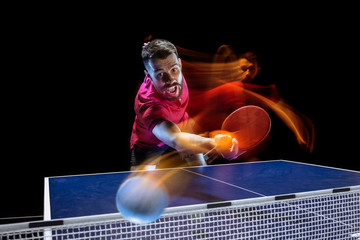 The table tennis player serving