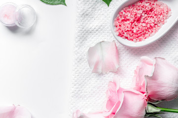 organic cosmetic with rose oil on white background top view