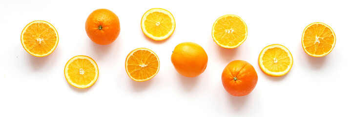 Creative flat layout of fruit, top view. Sliced orange isolated on white background.