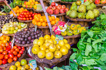 Fresh exotic fruits and vegetables in Mercado Dos Lavradores. Funchal, Madeira island, Portugal