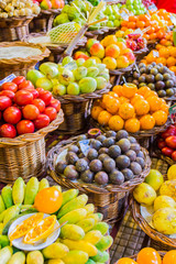 Fresh exotic fruits and vegetables in Mercado Dos Lavradores. Funchal, Madeira island, Portugal
