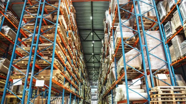 Logistics concept. Huge industrial warehouse, business shipping and cargo storage for export, pallets with goods on shelves, perspective