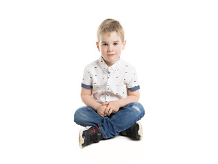 boy posing over white studio background