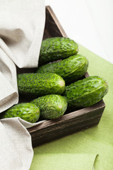 Diet organic cucumber in wooden box.