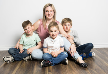 caucassian mother with child boy on studio white