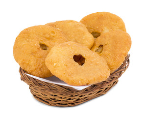 Indian Traditional Sweet Kachori Also Know As Mawa Kachori, Kachauri or Kachodi, Stuffed Kachori With Condensed Milk, Cheese and Dry Fruits And Served With Sugar Syrup isolated on White Background