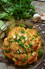 Roasted cauliflower on a wooden background
