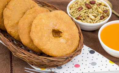 Indian Traditional Sweet Kachori Also Know As Mawa Kachori, Kachauri or Kachodi, Stuffed Kachori With Condensed Milk, Cheese and Dry Fruits And Served With Sugar Syrup