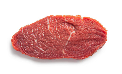 Fototapeta premium Raw beef meal slice, isolated on white background. Top view.