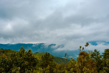 high mountains peaks range clouds in fog scenery landscape national park view outdoor  at Chiang Rai, Chiang Mai Province, Thailand