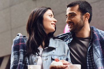 The couple is looking at each other in love.