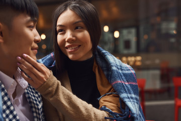 Fototapeta premium Guy with girl in cafe at table.
