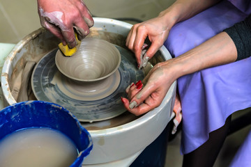 Working on potter's wheel close