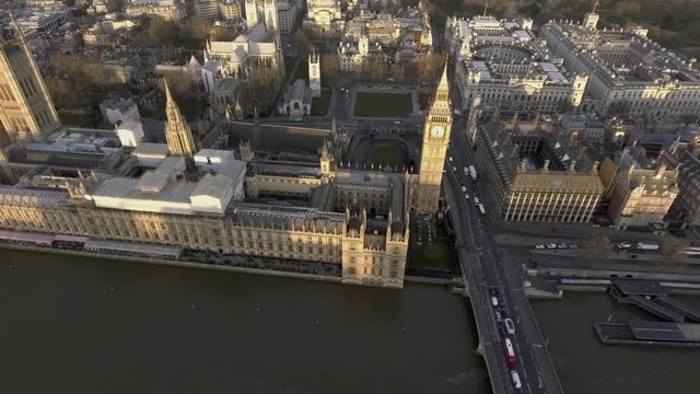 4K London Bird View of Houses of Parliament, Big Ben, Palace of Westminster and Gothic Historical Landmarks Buildings from Up High at Sunset in England, United Kingdom UK