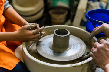 Working on potter's wheel close