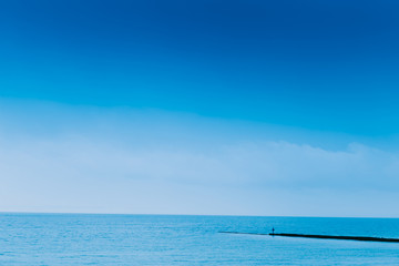 Fototapeta premium Beautiful blue sea. The mood is summer