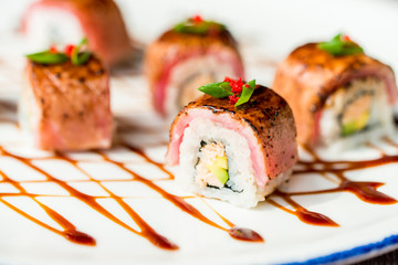 Traditional japanese sushi rolls in restaurant