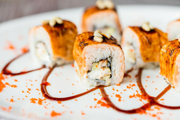 Traditional japanese sushi rolls in restaurant