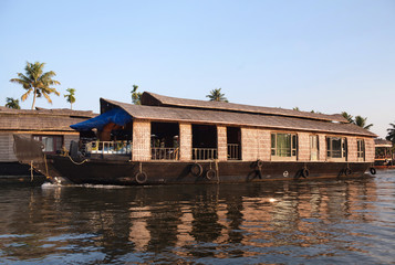 Fototapeta na wymiar Houseboat on backwaters in Kerala, South India