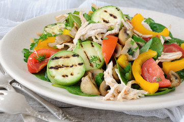 Warm chicken salad with vegetables
