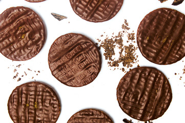 Round chocolate biscuits on white background