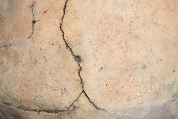 texture of an old orange glued jug of clay, background image