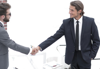 welcome and handshake of business partners