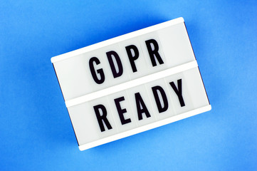 General Data Protection Regulation. Text GDPR ready on a display lightbox on blue background.