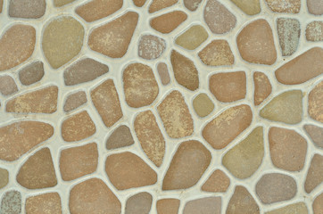Stone is a ceramic tile with a round stone pattern.