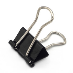 black paper clip isolated on white background, in the office
