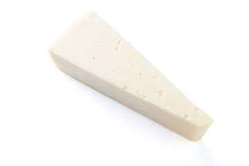 Semi hard cheese piece on a white background
