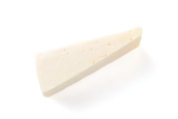 Semi hard cheese piece on a white background