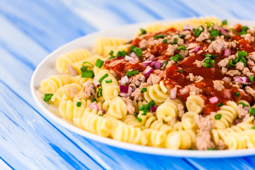 Fusilli with meat, tomato sauce and vegetables