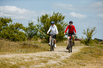 Fototapeta premium Healthy lifestyle - people riding bicycles